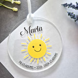 Medaļas ar saulēm un mākoņiem